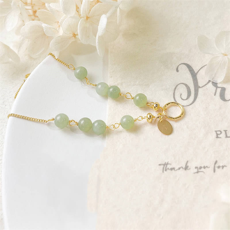 Bracelet porte-bonheur en perles de jade Hetian naturel unique de Buddha Stones rempli d'or 14 carats