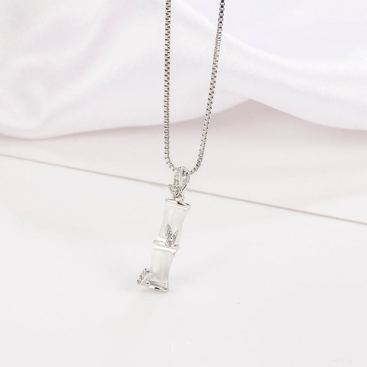 Collier pendentif harmonieux en calcédoine et bambou avec Buddha Stones