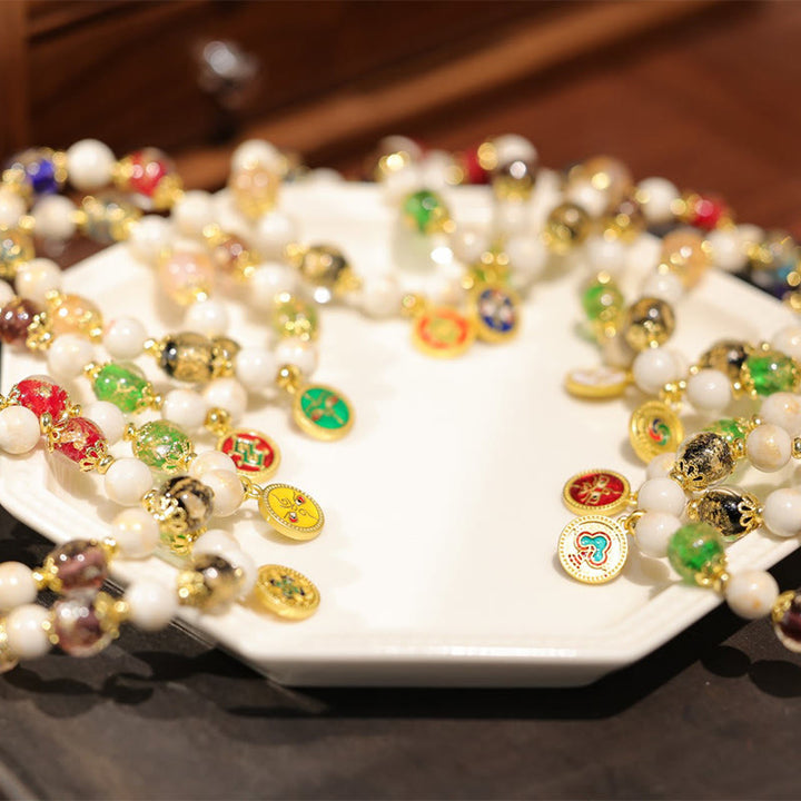 Buddha Stones Tibétain Cinq Dieux de la Richesse Fortune Liuli Perles de Verre Encens Cendres Perles de Porcelaine Bracelet à Breloques