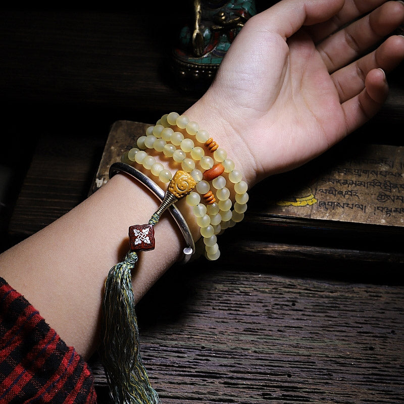 Bracelet porte-bonheur en ambre avec 108 Buddha Stones de Mala en corne de mouton du Tibet