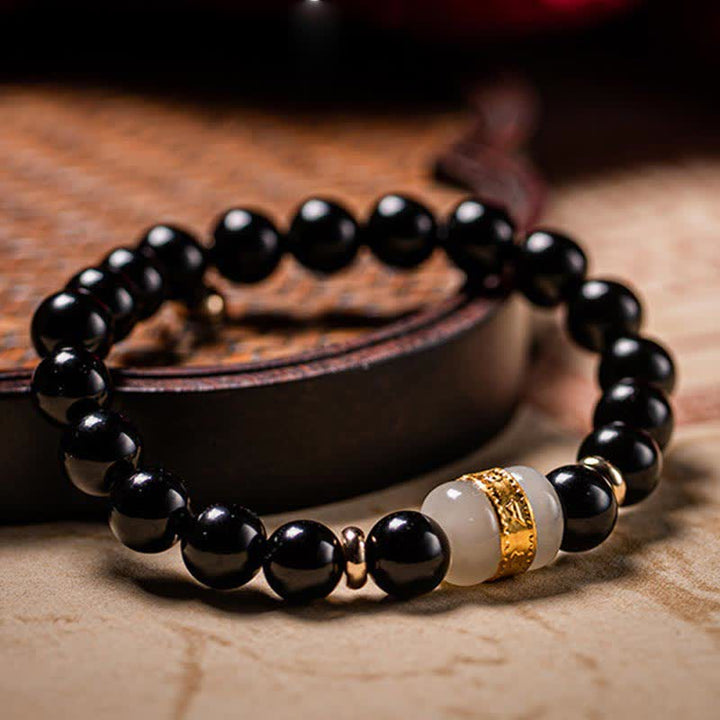Bracelet magnétique pour couple en obsidienne Buddha Stones et jade Om Mani Padme Hum