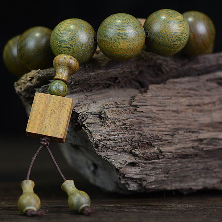 Bracelet de guérison tibétain en bois de santal vert Buddha Stones - image 5