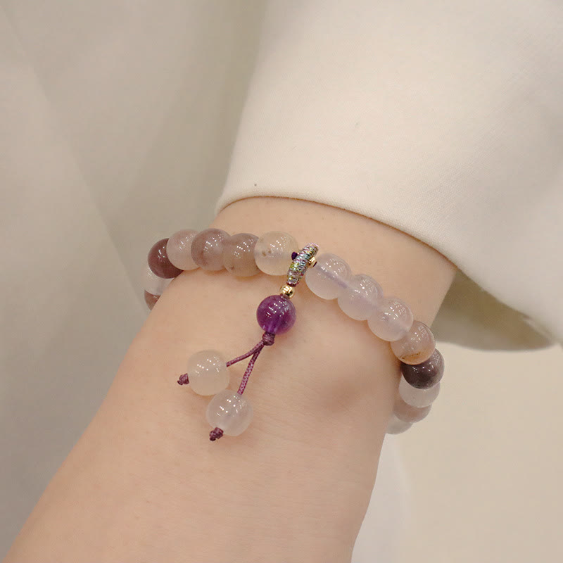 Bracelet de richesse en perles de jade violet doré en Buddha Stones
