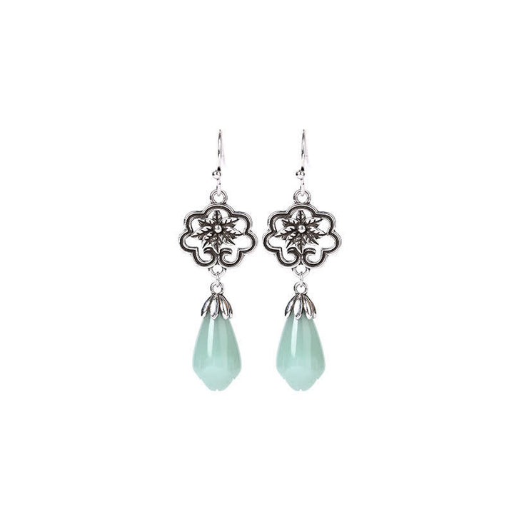 Boucles d'oreilles pendantes en jade et fleur de magnolia Buddha Stones
