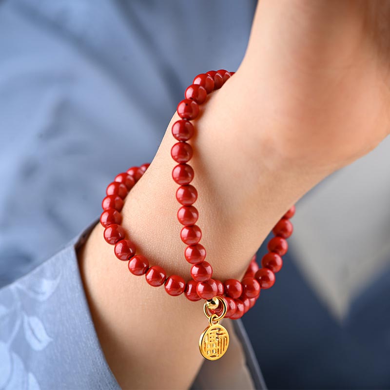 Collier porte-bonheur tibétain en aventurine verte et cinabre avec Buddha Stones
