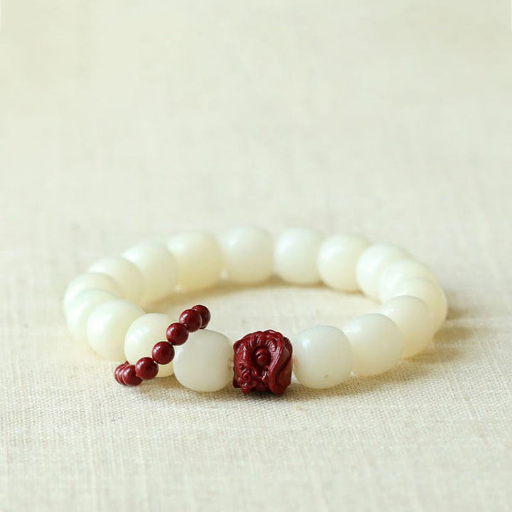 Buddha Stones de Bodhi Naturelles Cinabre Lion Dansant Charme Sagesse Harmonie Poignet Mala