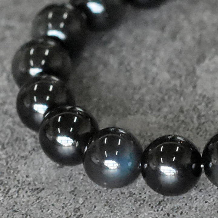 Bracelet de transformation positive en perles de cuivre et obsidienne arc-en Buddha Stones