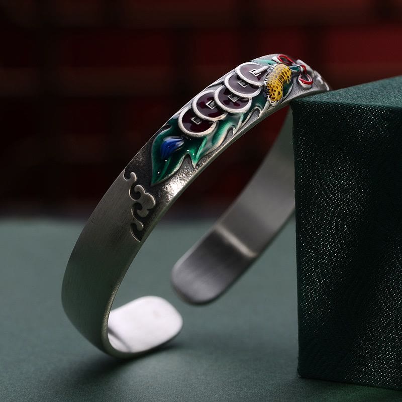 Bracelet Feng Shui en Buddha Stones avec cinq pièces de monnaie de l'empereur et cacahuètes