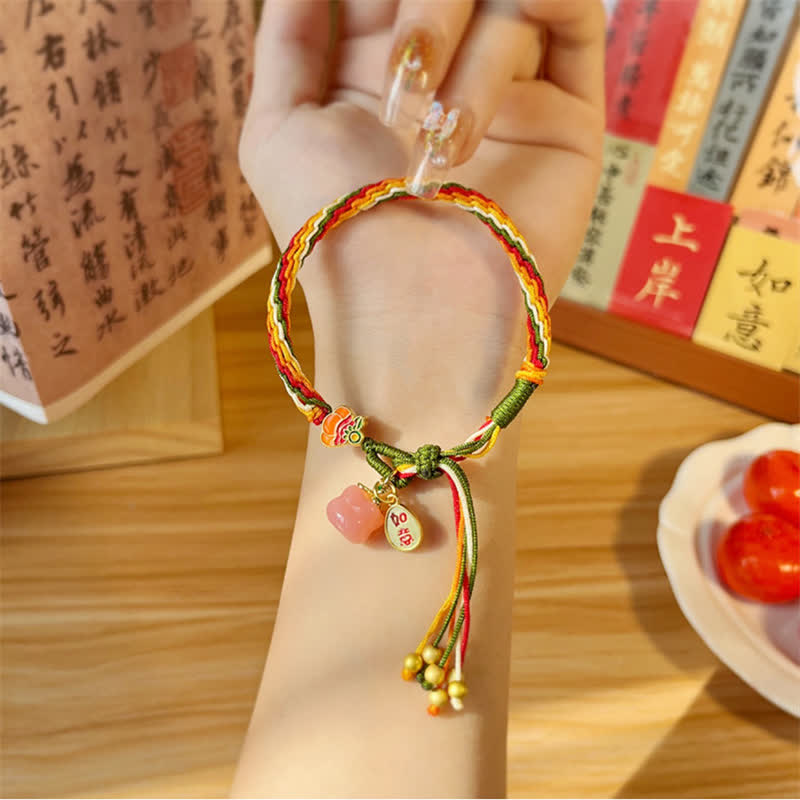 Bracelet tressé en corde avec nœud de force et de réincarnation en agate rouge et Buddha Stones