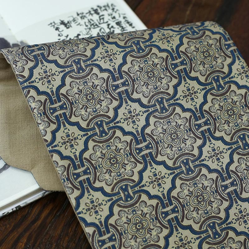 Dessous de verre élégant à motif de brocart floral pour tasse à thé