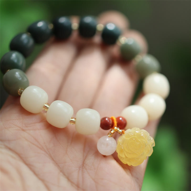 Bracelet de paix en ambre et graines de Bodhi avec Buddha Stones dégradées