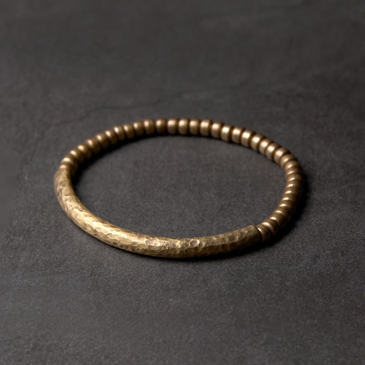 Bracelet porte-bonheur en perles de cuivre et de laiton au design simple Buddha Stones