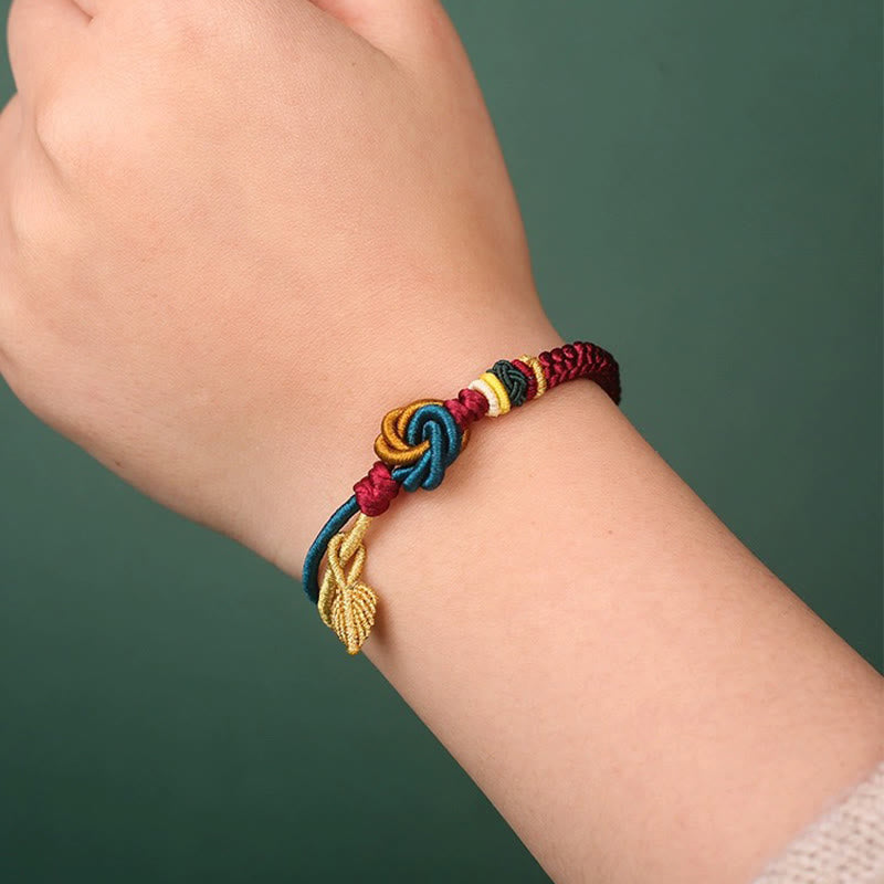 Bracelet tibétain en corde porte-bonheur fait main avec nœud mandala et Buddha Stones