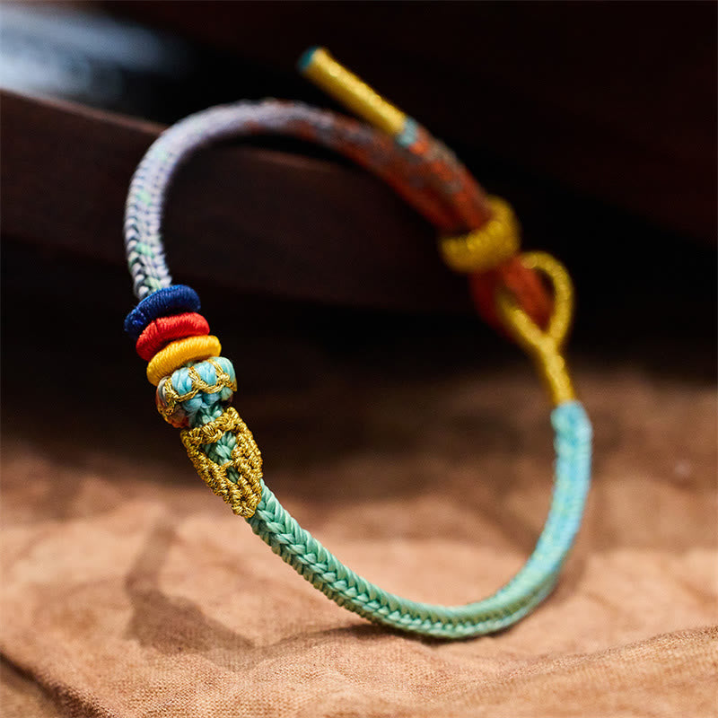 Bracelet fait main avec corde colorée et huit fils en Buddha Stones et nœud de paix - Turquoise et bleu (tour de poignet 14-19 cm) - image 0