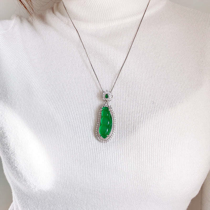 Collier pendentif porte-bonheur en jade cyan Fortune Bean