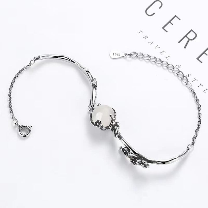 Bracelet positif en calcédoine et fleur de prunier avec Buddha Stones