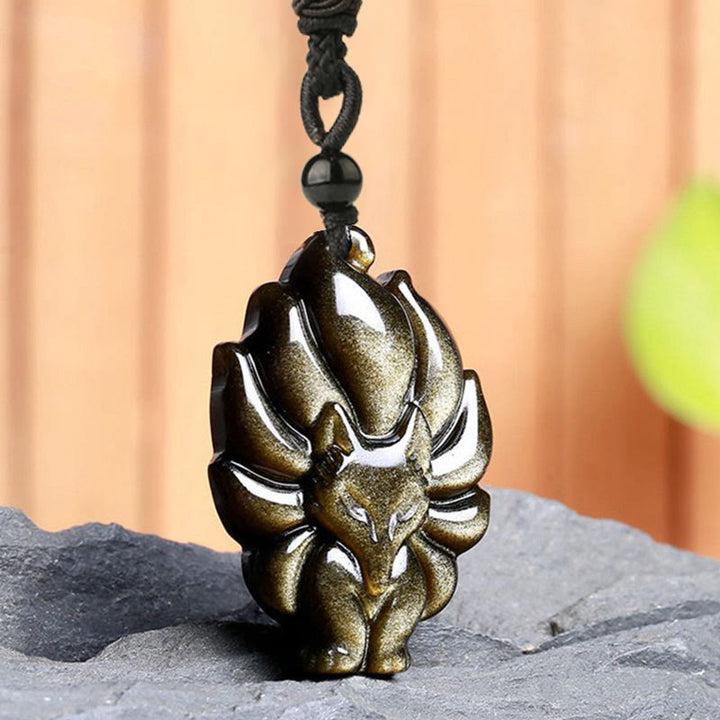 Collier de protection avec pendentif en Buddha Stones dorés