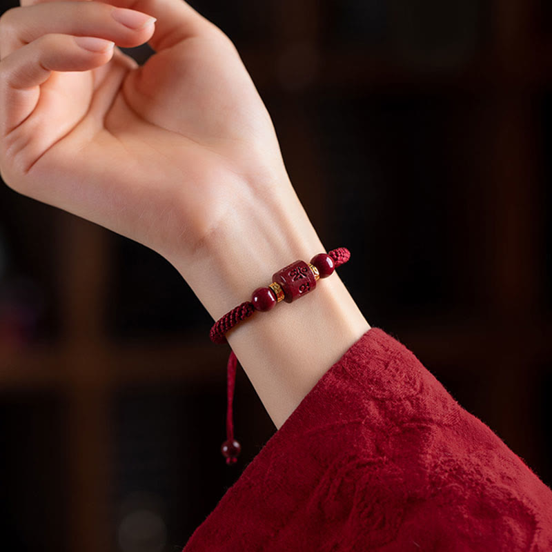 Bracelet tressé avec Buddha Stones tibétaines en cinabre Om Mani Padme Hum gravé et bénédiction