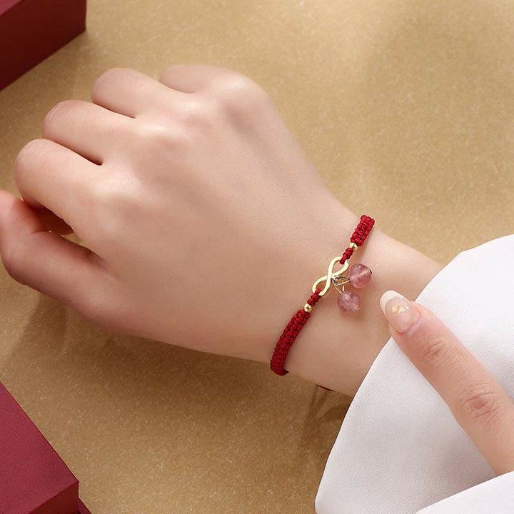 Bracelet tissé en fil rouge avec nœud sans fin en cristal de quartz fraise et Buddha Stones
