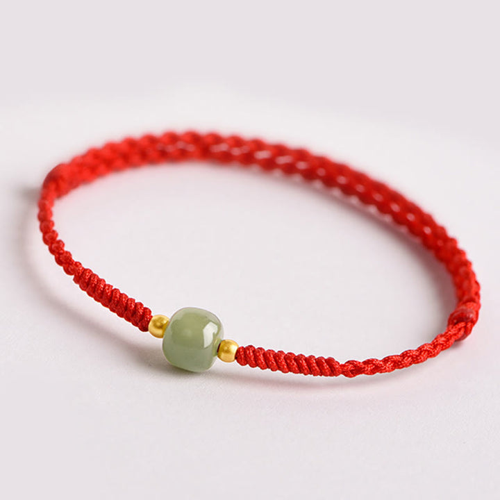 Bracelet tressé en perles de jade porte-bonheur et prospérité fait main avec Buddha Stones