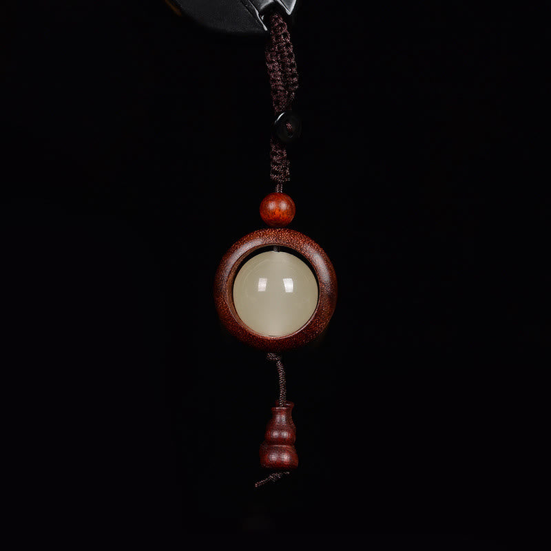 Porte-clés porte-bonheur lumineux en Buddha Stones en bois de santal rouge et bois d'ébène en bois de santal vert