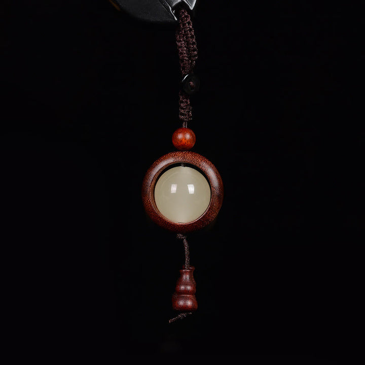 Porte-clés porte-bonheur lumineux en Buddha Stones en bois de santal rouge et bois d'ébène en bois de santal vert