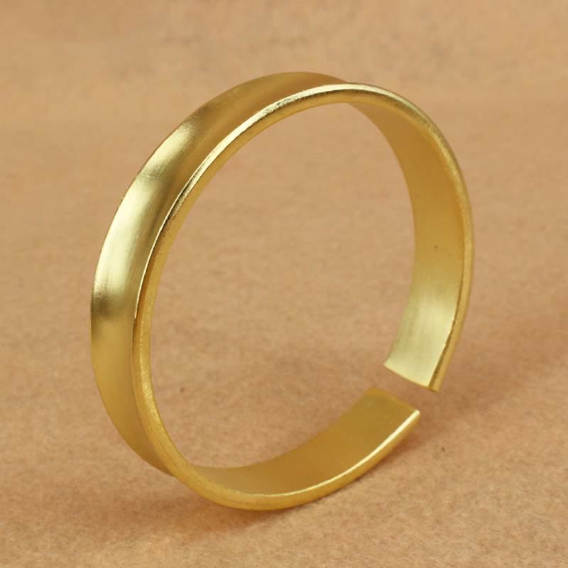 Bracelet manchette porte-bonheur en cuivre