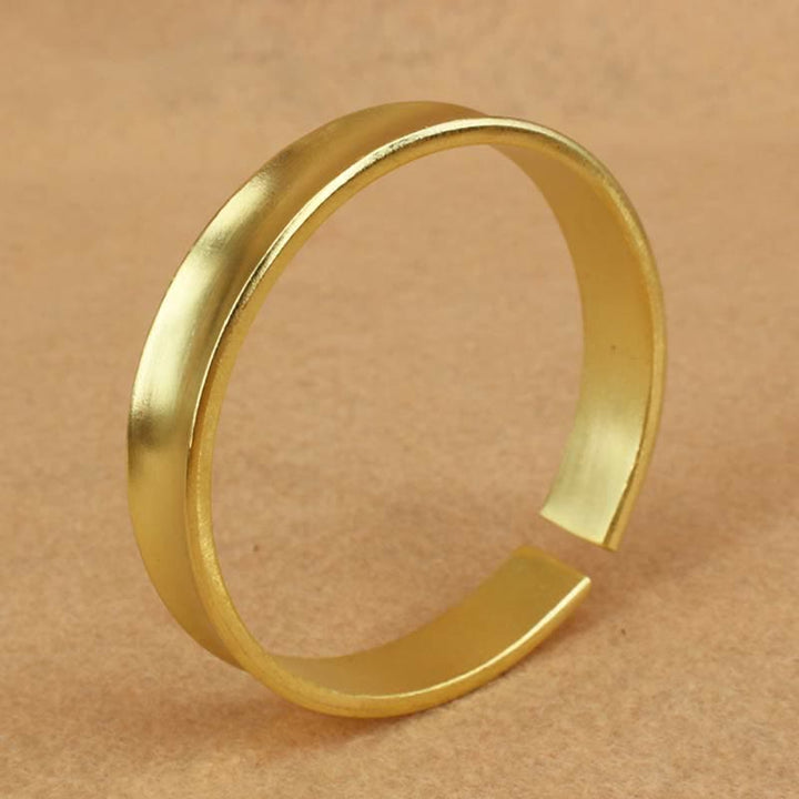 Bracelet manchette porte-bonheur en cuivre