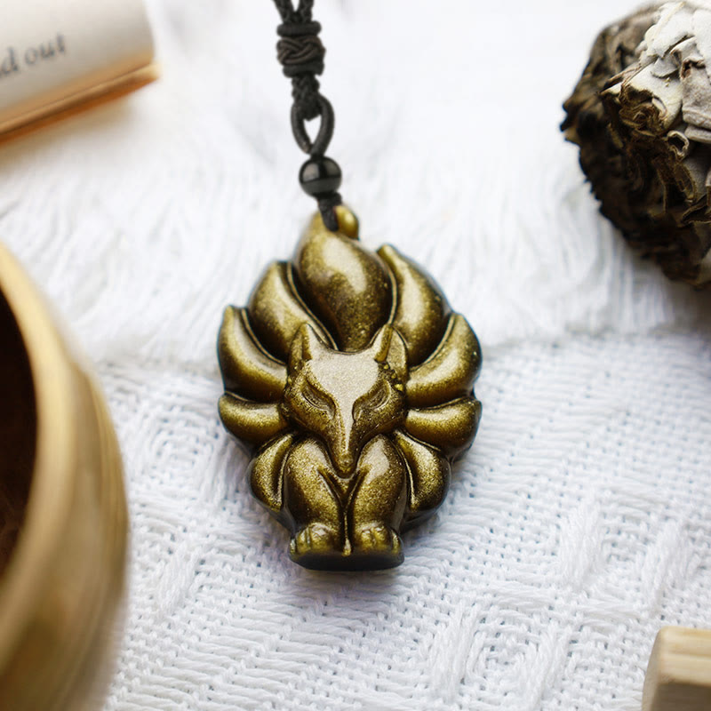 Collier de protection avec pendentif en Buddha Stones dorés