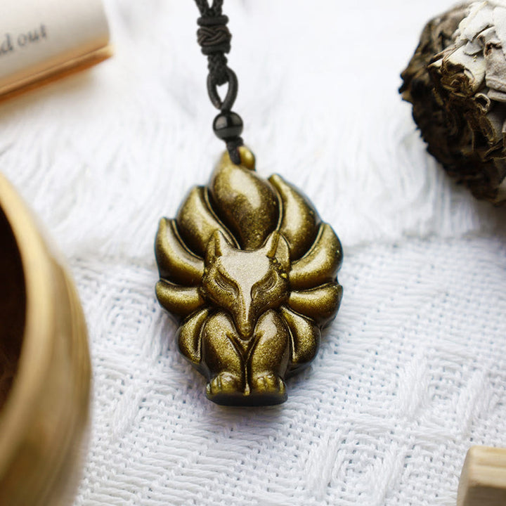 Collier de protection avec pendentif en Buddha Stones dorés