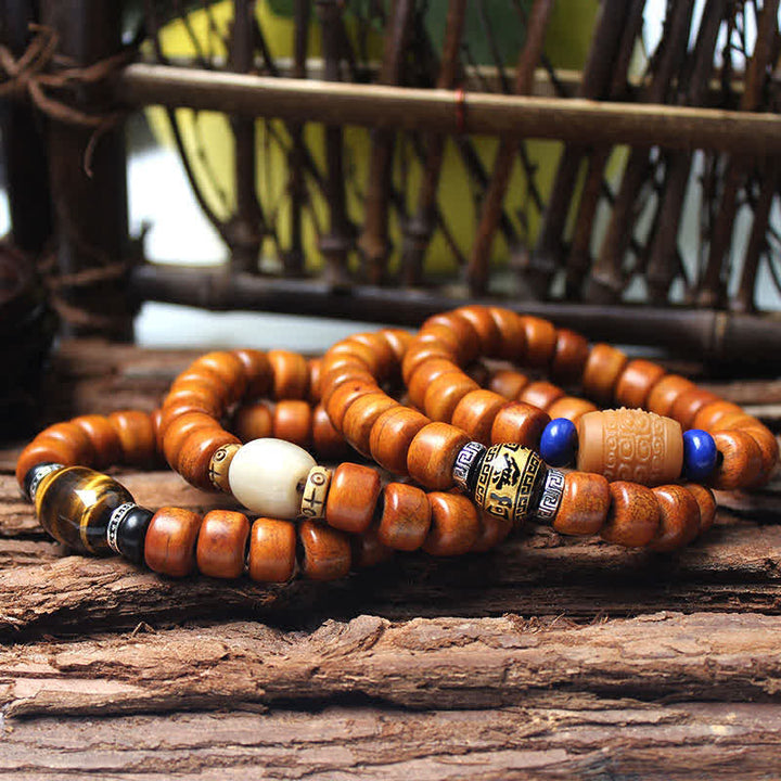 Bracelet de force en Buddha Stones, perles d'os tibétaines Om Mani Padme Hum