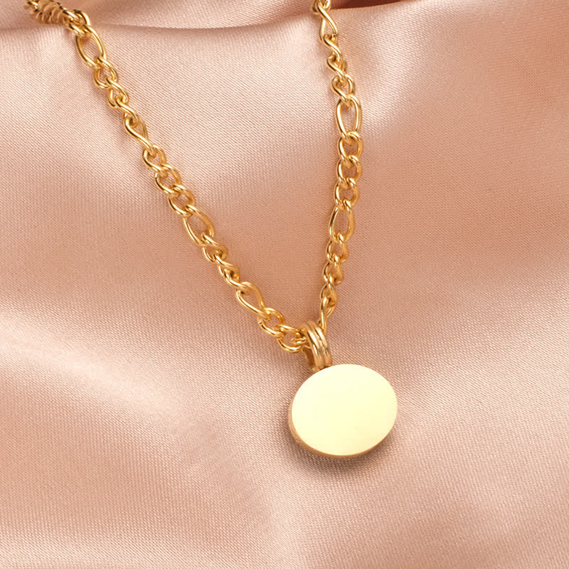 Collier pendentif ovale en acier titane et turquoise