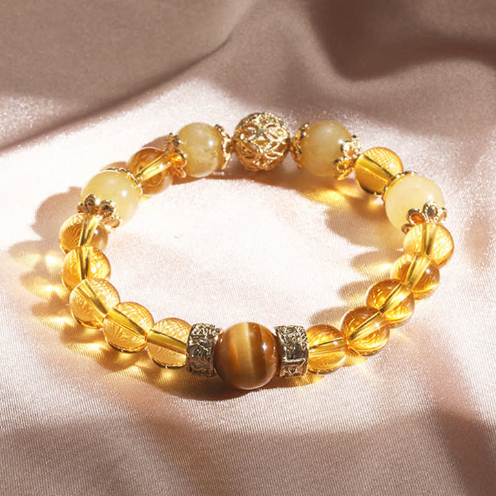 Bracelet de perles de prospérité et de générosité en Buddha Stones et citrine