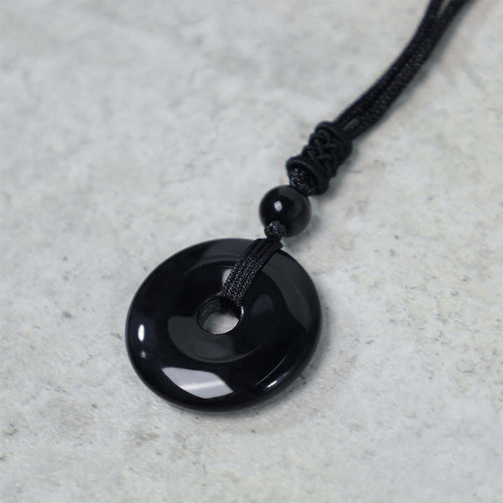 Collier avec pendentif porte-bonheur en Buddha Stones précieuses en cristal de guérison