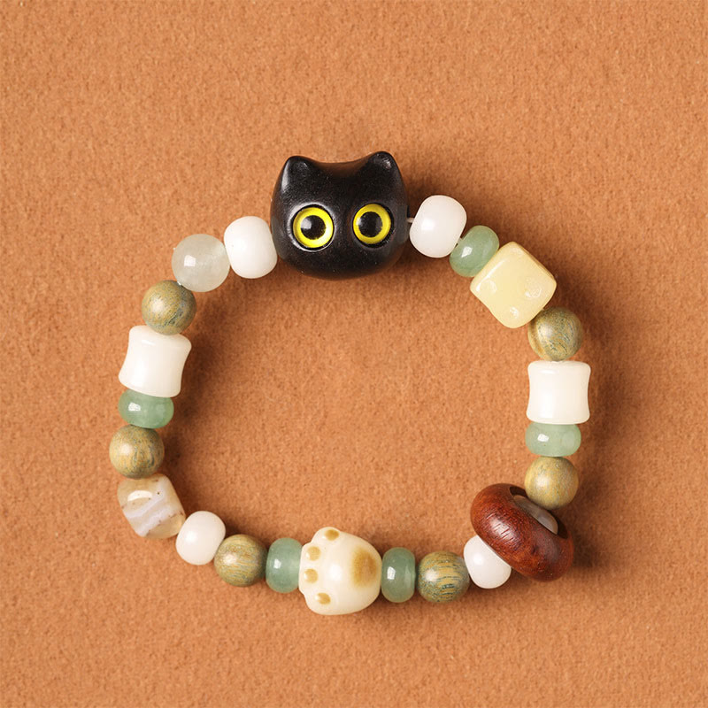 Buddha Stones Graine de Bodhi Bois de santal vert Bois d'ébène Petite feuille Bois de santal rouge Tête de chat Patte Griffe Bracelet de paix - Chat en bois d'ébène (yeux jaunes) (tour de poignet 14-16 cm) - image 15