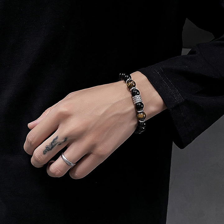 Bracelet de force et d'accomplissement en obsidienne noire naturelle œil de tigre Buddha Stones