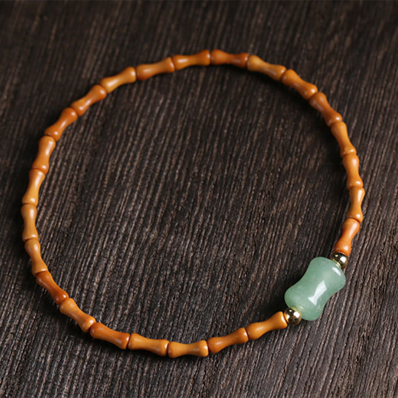 Bracelet porte-bonheur en aventurine verte naturelle avec noyau d'olive et pierres de Buddha Stones