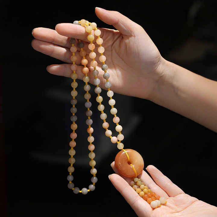 Collier pendentif tibétain en jade doré et soie Buddha Stones