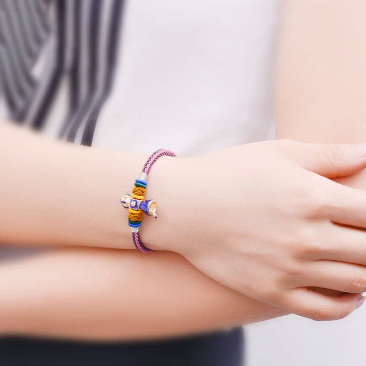 Bracelet tibétain fait main en corde Dorje Vajra à huit fils