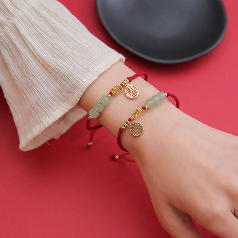 Bracelet porte-bonheur en corde rouge avec perles de jade fabriquées à la main par Buddha Stones