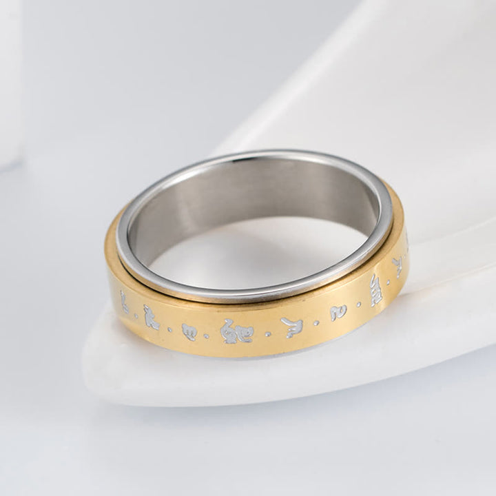 Bague rotative d'équilibre en acier titane avec mantra Buddha Stones