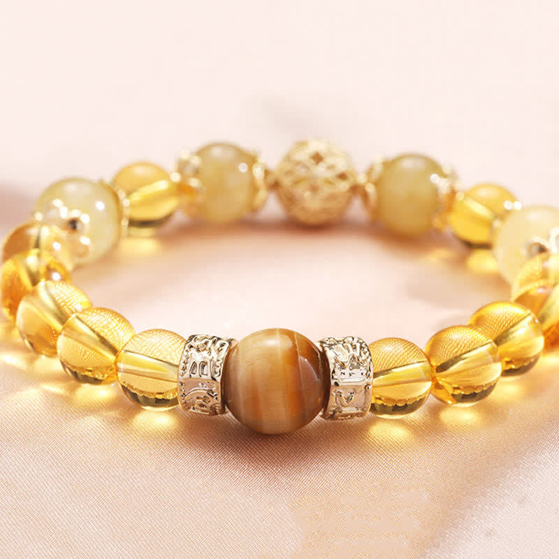 Bracelet de perles de prospérité et de générosité en Buddha Stones et citrine