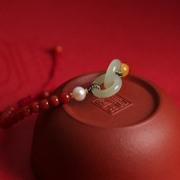 Bracelet de confiance à double boucle de paix en agate rouge naturelle et jade Hetian de Buddha Stones