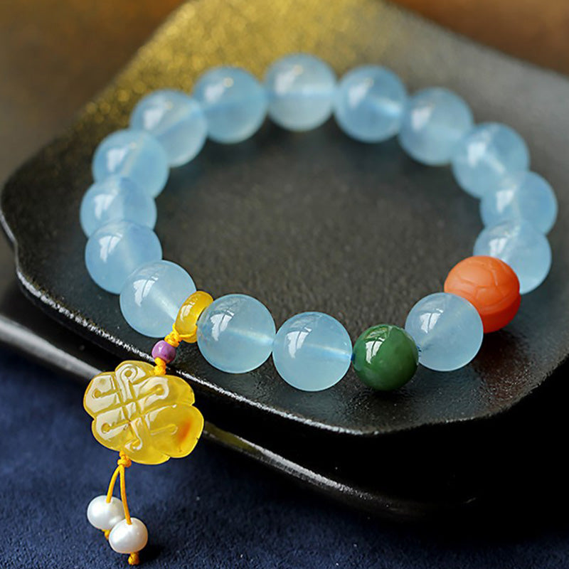 Bracelet de paix avec breloque en ambre et aigue-marine naturelle