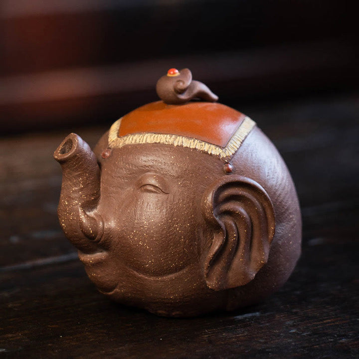 Théière en céramique et argile violette avec Buddha Stones et éléphant mignon et nuages de bon augure