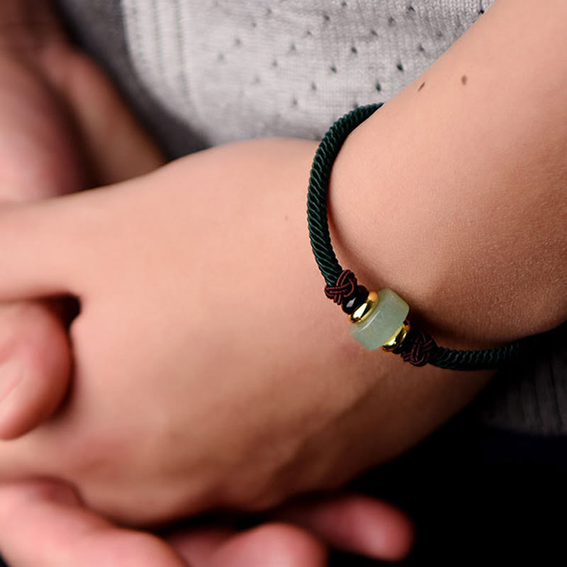 Bracelet porte-bonheur tressé en aventurine verte tibétaine avec Buddha Stones