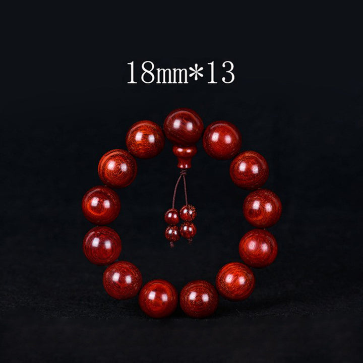 Bracelet d'équilibre tibétain en petites feuilles de santal rouge avec Buddha Stones