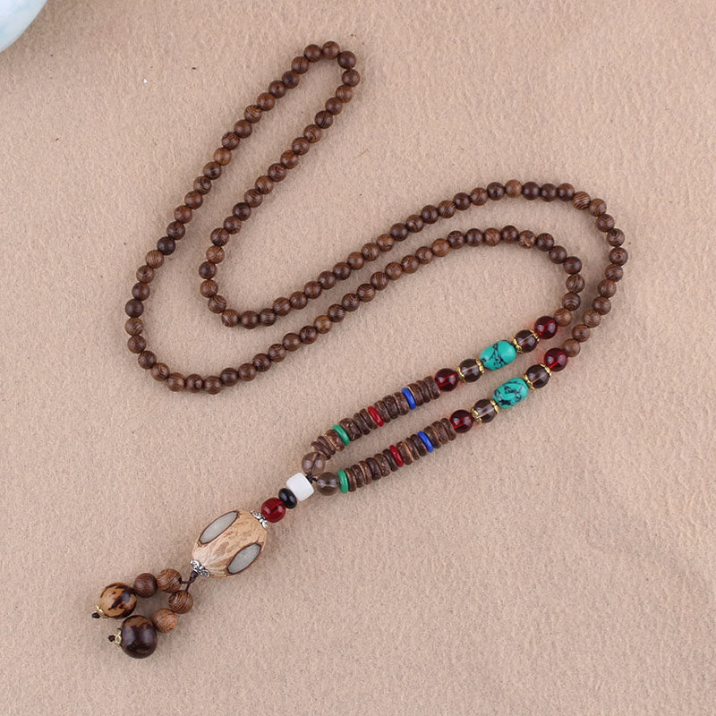Collier pendentif protection éléphant en Buddha Stones tibétain en bois de wengé Bodhi Seed Agate