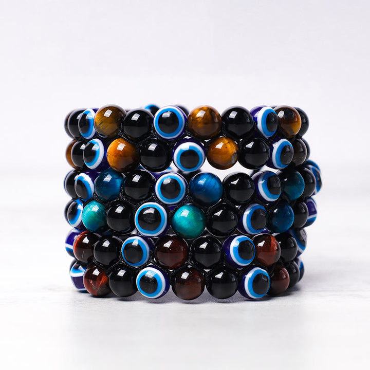 Bracelet de perles de protection contre le mauvais œil en hématite et œil de tigre Buddha Stones