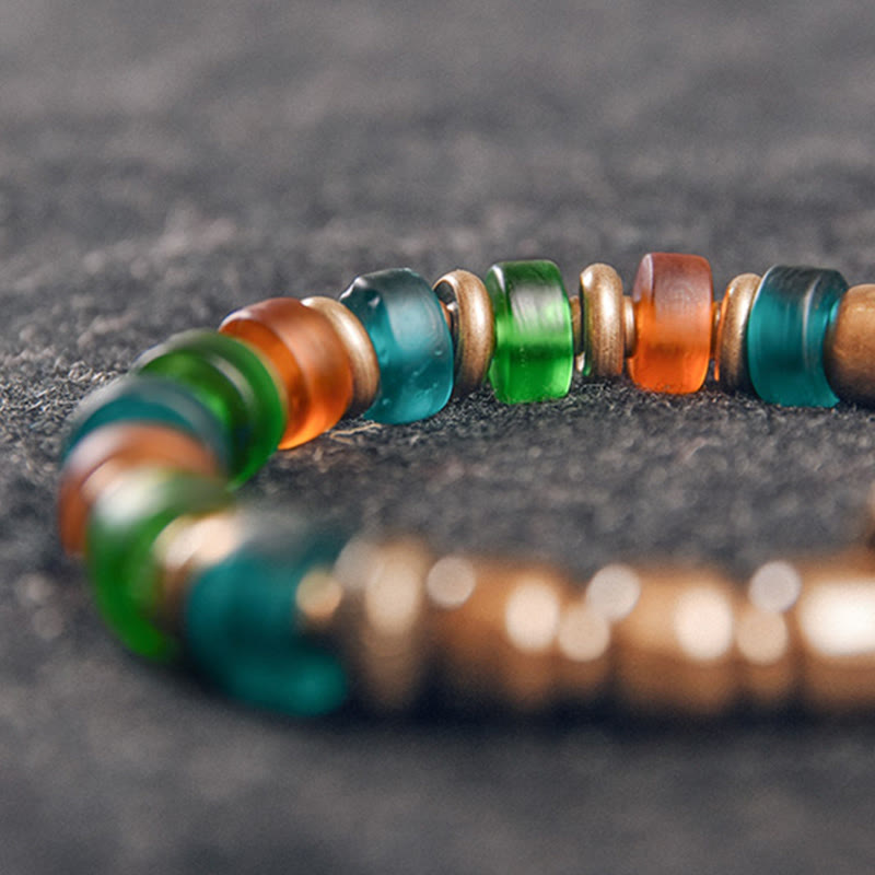 Bracelet tibétain en perles de verre colorées et en cuivre